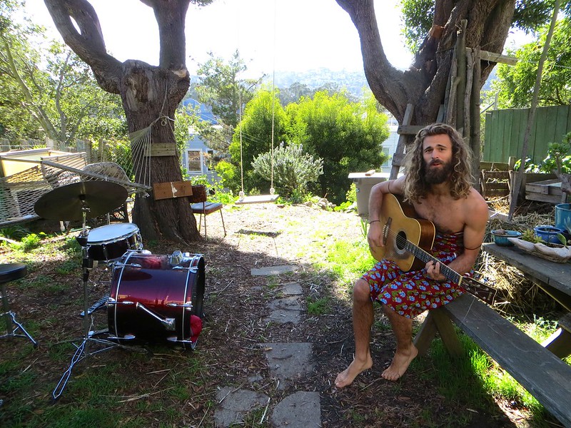 Gorgeous guy with long hair and nice muscles